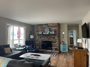 Living area - Charming 3-bedroom lake front property on Middle Lake.  Private beach and dock. (Twin Lake)