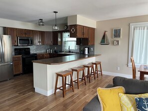 Living area - Charming 3-bedroom lake front property on Middle Lake.  Private beach and dock. (Twin Lake)