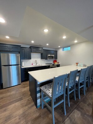 Private kitchen - Charming 3-bedroom lake front property on Middle Lake.  Private beach and dock. (Twin Lake)