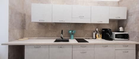 Camera | Private kitchenette | Espresso maker, microwave, electric kettle