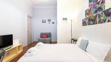 Departamento (1 Bedroom) | 1 habitación, tabla de planchar con plancha y ropa de cama