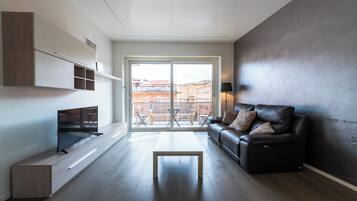 Apartment (1 Bedroom) | Living area | TV