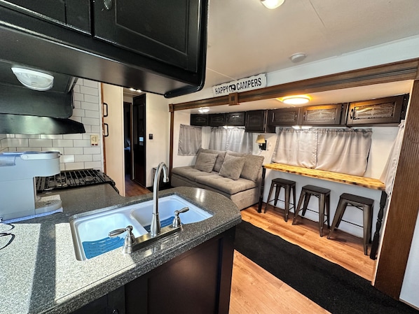 Interior - Happy Campers RV Stay • Private Yard • Sleeps 4-6 (Magnolia)