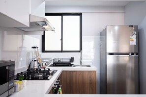 Private kitchen - Serene 2-bedroom apartment in charming Cusco near historic sites (Cusco)