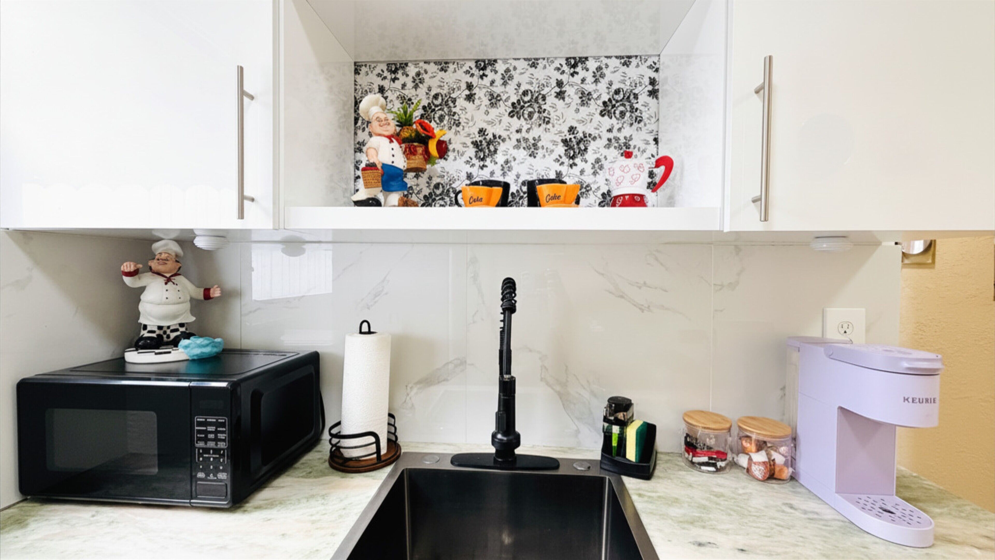 Fridge, microwave, coffee/tea maker, cookware/dishes/utensils