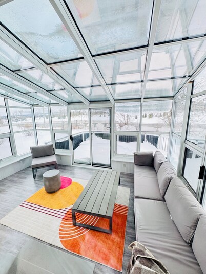 Charming Sunroom Home with Cozy Living Spaces