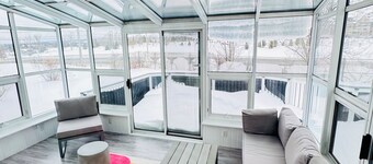 Charming Sunroom Home with Cozy Living Spaces
