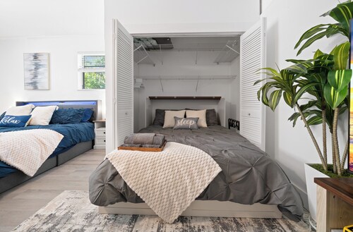 Private suite with pool access near WEC, Downtown, Restaurants, Publix & More!