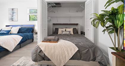 Private suite with pool access near WEC, Downtown, Restaurants, Publix & More!