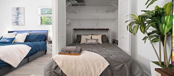 Private suite with pool access near WEC, Downtown, Restaurants, Publix & More!