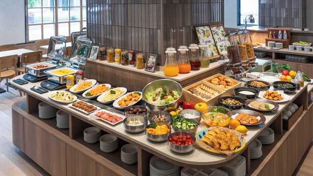 A buffet with various food items and condiments. - JR Clement Inn Takamatsu Hyogomachi (Takamatsu)