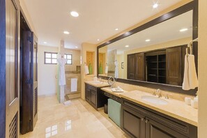 Shower, jetted bath, eco-friendly toiletries, hair dryer - 1BR at Garza Blanca Vallarta-Beachfront Resort Stay at Garza Blanca (Puerto Vallarta)