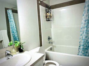 Hair dryer, towels, soap, toilet paper - Cozy 2  Bedroom Guest Suite close to YYC Airport! (Calgary)