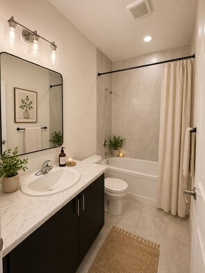 Hair dryer, towels, soap, toilet paper