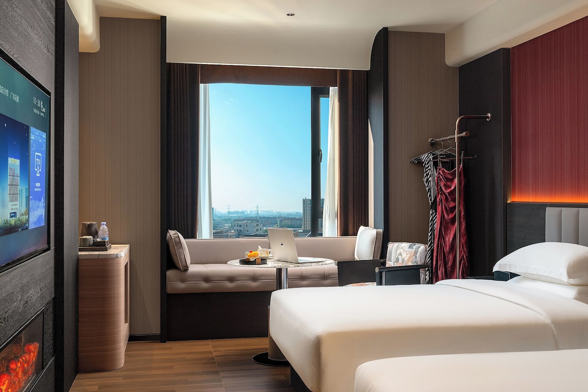 Quarto duplo superluxo, vista para a cidade