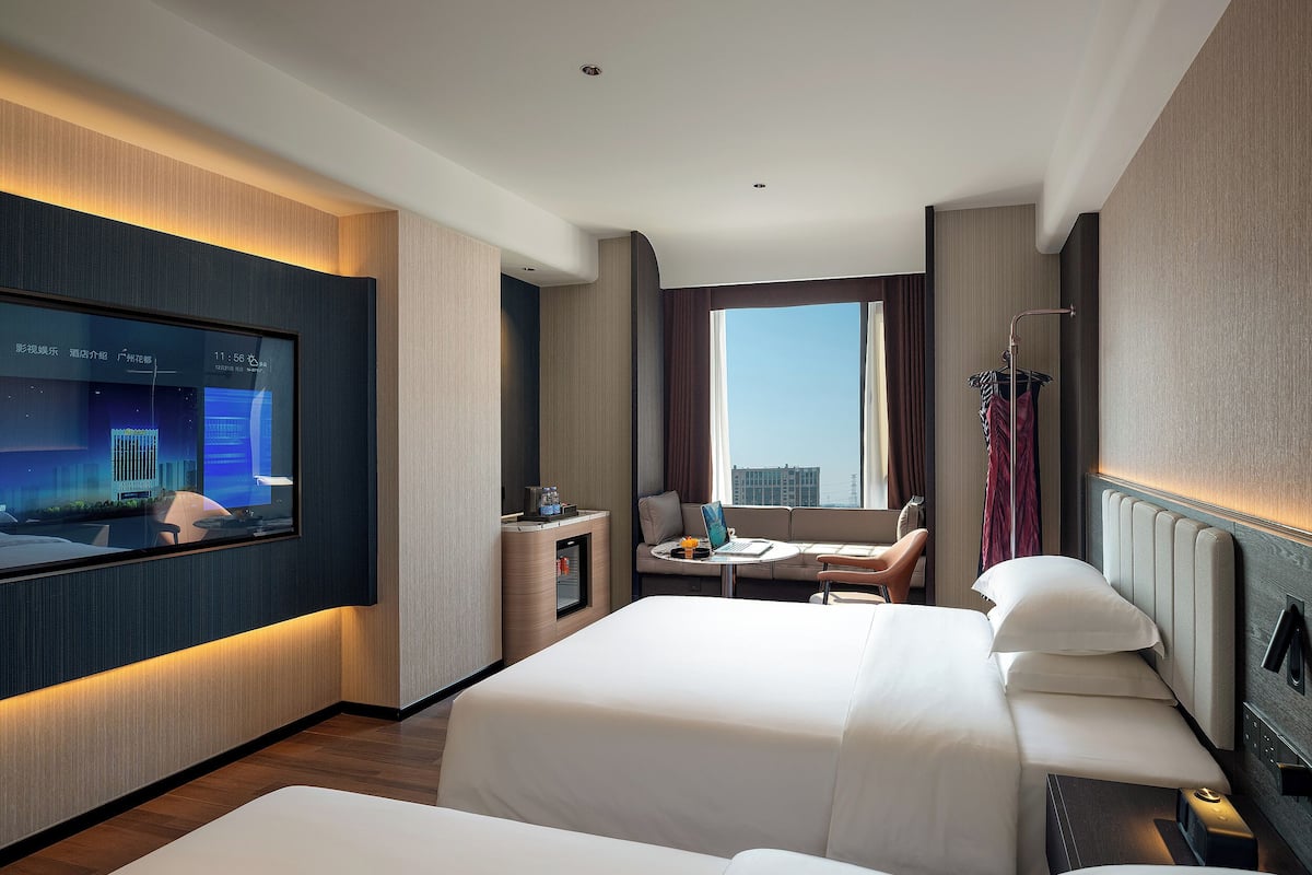 Quarto duplo superior, vista para a cidade