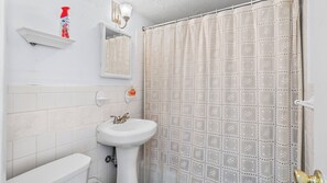 Regadera y secadora de cabello 