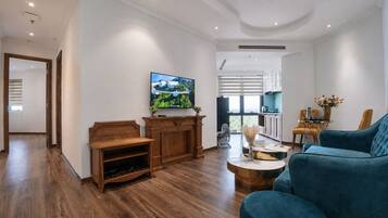 Family Quadruple Room, 2 Bedrooms, River View | Minibar, desk, laptop workspace, blackout curtains