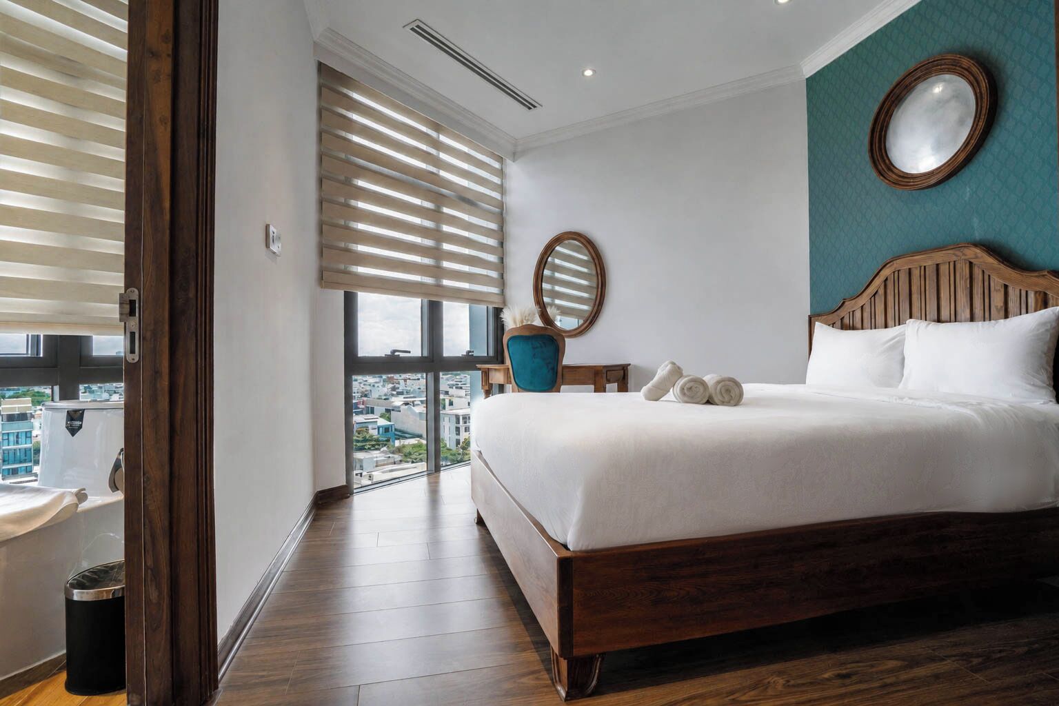 Family Quadruple Room, 2 Bedrooms, River View | Minibar, desk, laptop workspace, blackout curtains