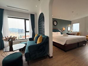 Signature Studio Suite, River View | Minibar, desk, laptop workspace, blackout drapes - Elite Riverlight Hotel by Elite24 (Da Nang)