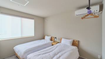 Blackout drapes, iron/ironing board, free WiFi, bed sheets