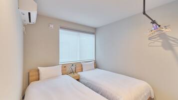 Blackout drapes, iron/ironing board, free WiFi, bed sheets