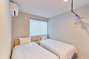 遮光布/窗簾、熨斗/熨衣板、免費無線上網、床單