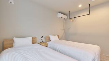 Blackout curtains, iron/ironing board, free WiFi, bed sheets