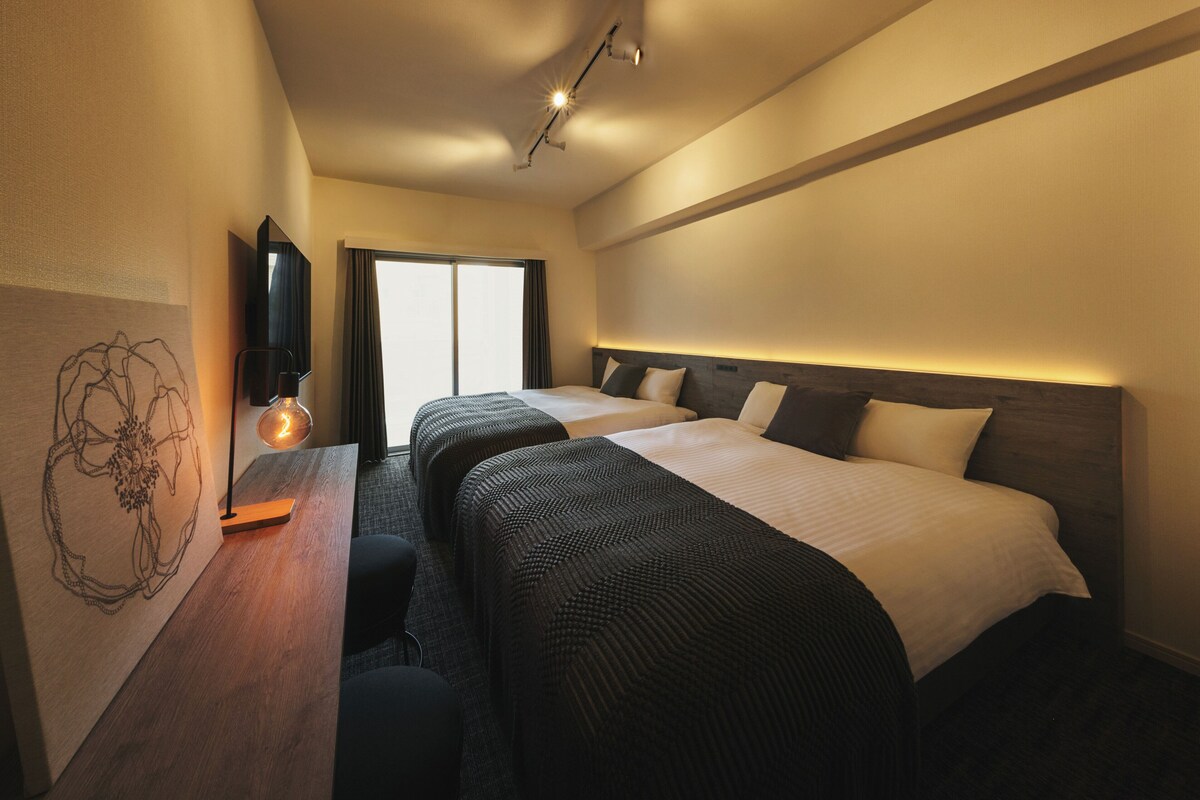 Habitación con 2 camas individuales | Wifi gratis y ropa de cama