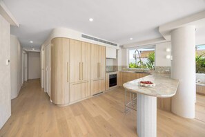 Fridge, microwave, oven, stovetop - Sabbia Coastal Luxury - Private Courtyard Oasis (Caloundra Region)