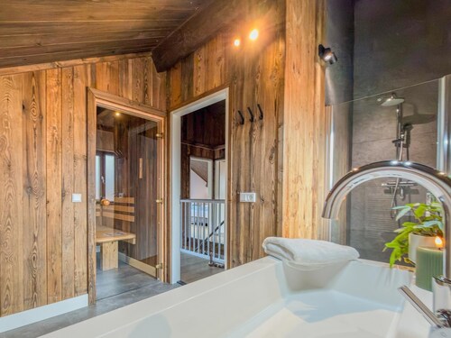 Chalet by a lake with stunning mountain views