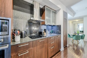 Classic Studio Suite, City View | Private kitchen - The Theatre District Suites (Toronto)