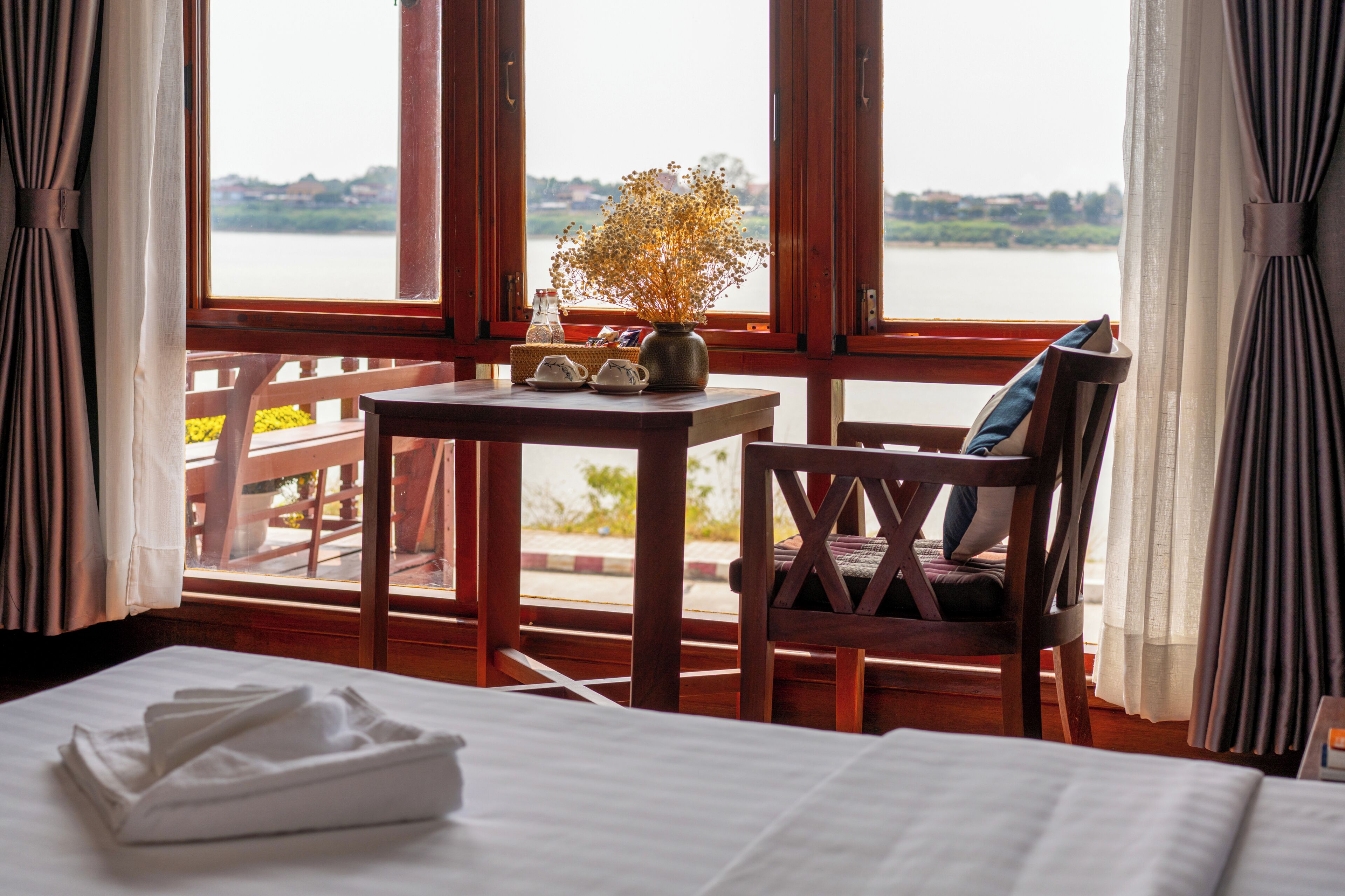 Deluxe Double Room, Balcony, River View | Desk, laptop workspace, blackout curtains, soundproofing