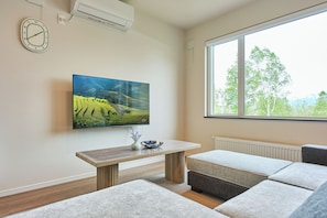 Family Villa, Mountain View | Living area | Flat-screen TV - Shikauchi Furano (Nakafurano)