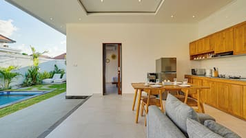 Villa, Pool View | Living room | 50-inch Smart TV with digital channels, Netflix, streaming services