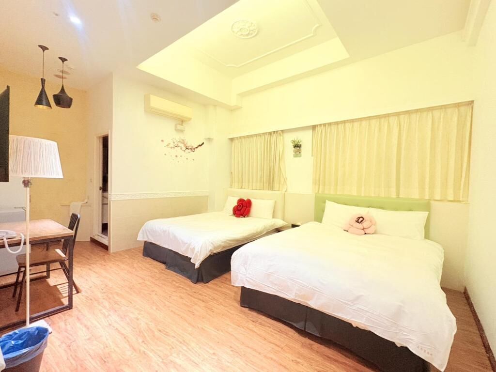 Neljän hengen deluxe-huone