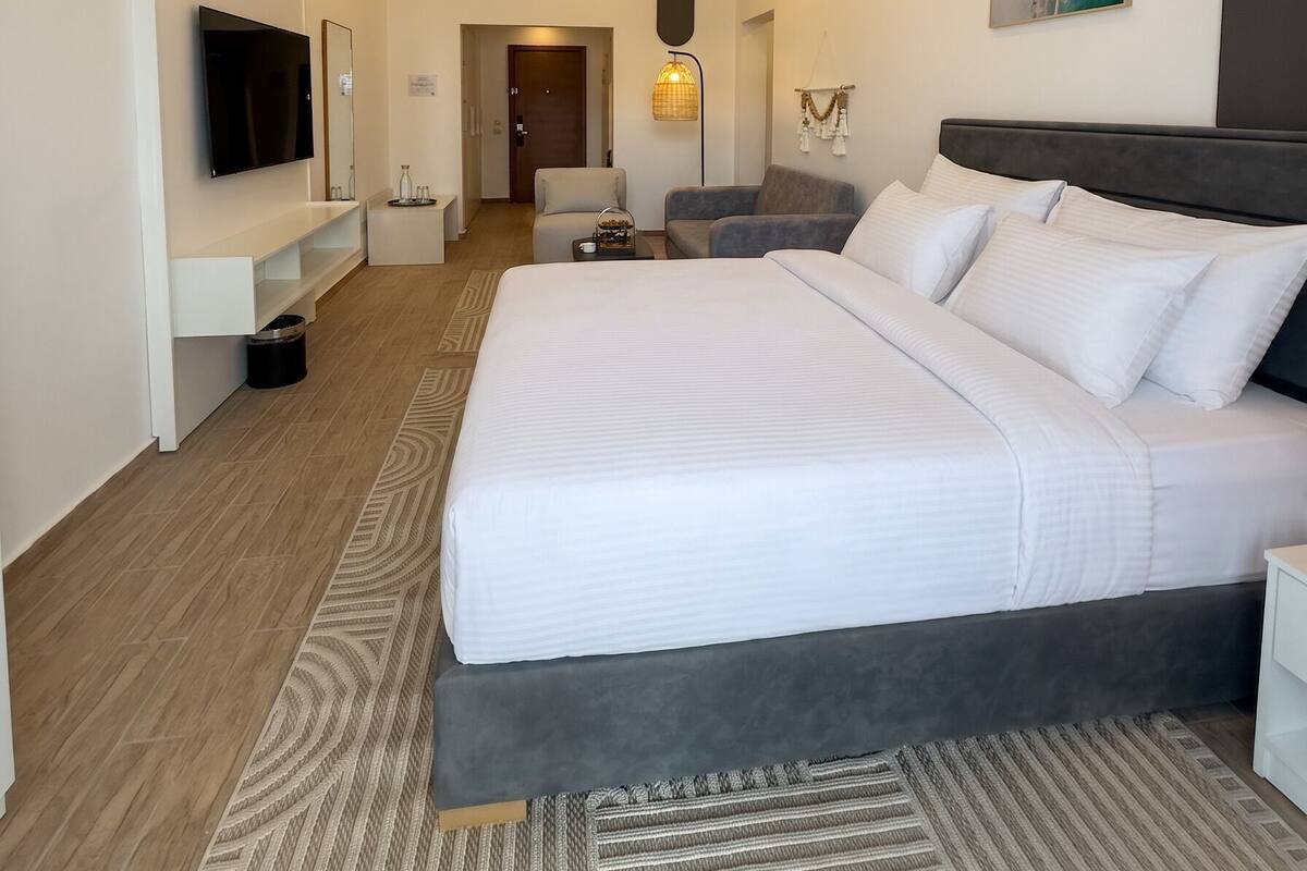 Family Suite | Minibar, in-room safe, iron/ironing board, free cots/infant beds
