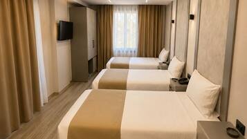 Classic Triple Room, Balcony, City View | Individually decorated, desk, laptop workspace, free WiFi