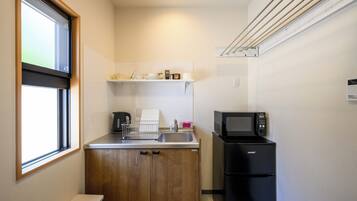 Apartment, Garden View | Private kitchen | Fridge, microwave, cookware/dishes/utensils