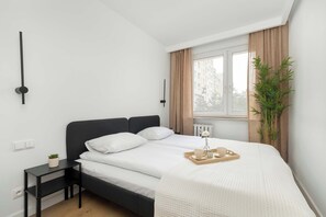 1 habitación, tabla de planchar con plancha, cuna de viaje y wifi 