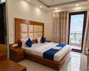 Deluxe Room | Laptop workspace, free WiFi, bed sheets - OnlyStay Restivo Golf Course Road  (Gurugram)