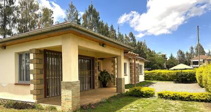 Spacious 4BR Farmhouse Retreat with Large Kitchen & Peaceful Surroundings.