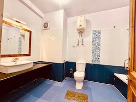 Shower, towels, soap, shampoo