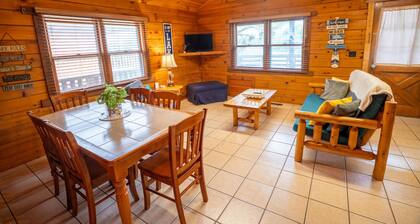 Sunrise Cove Log Cabin - Sunrise Cove is your perfect family escape on Lake Barkley! This charming log cabin offers two bedrooms, a sleeping loft, full kitchen, and bathroom with shower.