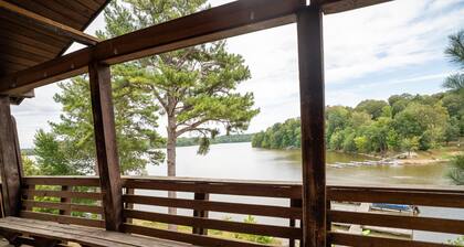 Sunrise Cove Log Cabin - Sunrise Cove is your perfect family escape on Lake Barkley! This charming log cabin offers two bedrooms, a sleeping loft, full kitchen, and bathroom with shower.