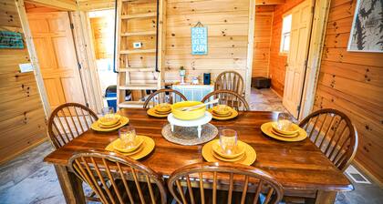Lake Barkley Log Cabin - Lake Barkley Log is your perfect family escape on Lake Barkley! This charming log cabin offers two bedrooms, a sleeping loft, full kitchen, and bathroom with shower.