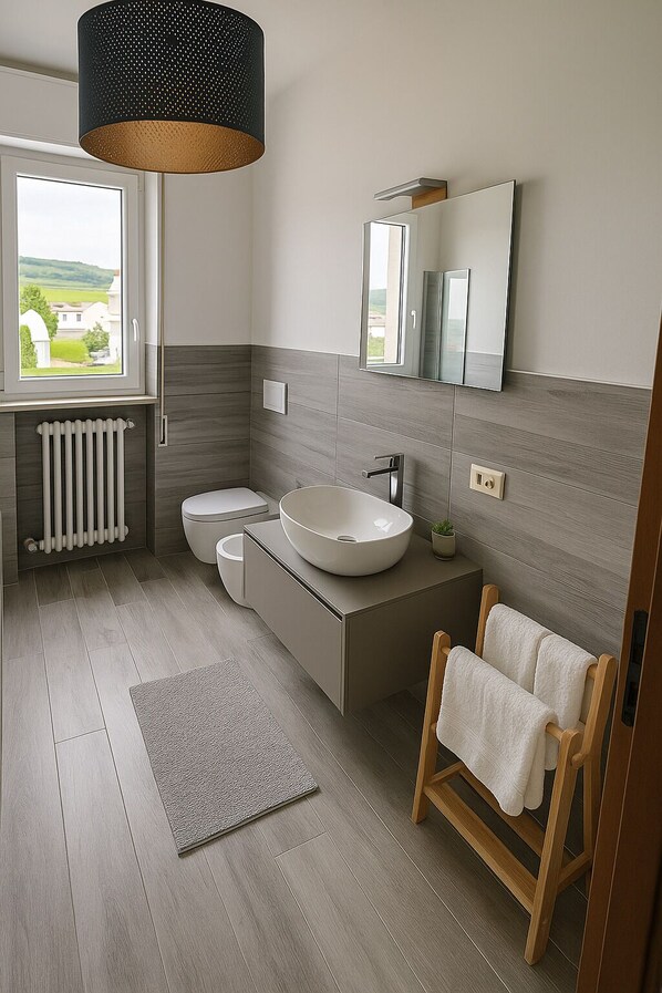 Hair dryer, bidet, towels, soap