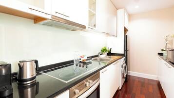 Fridge, microwave, stovetop, coffee/tea maker