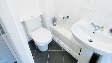 Hair dryer, towels, soap, toilet paper