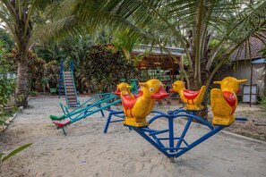 Habitación triple Deluxe | Área infantil